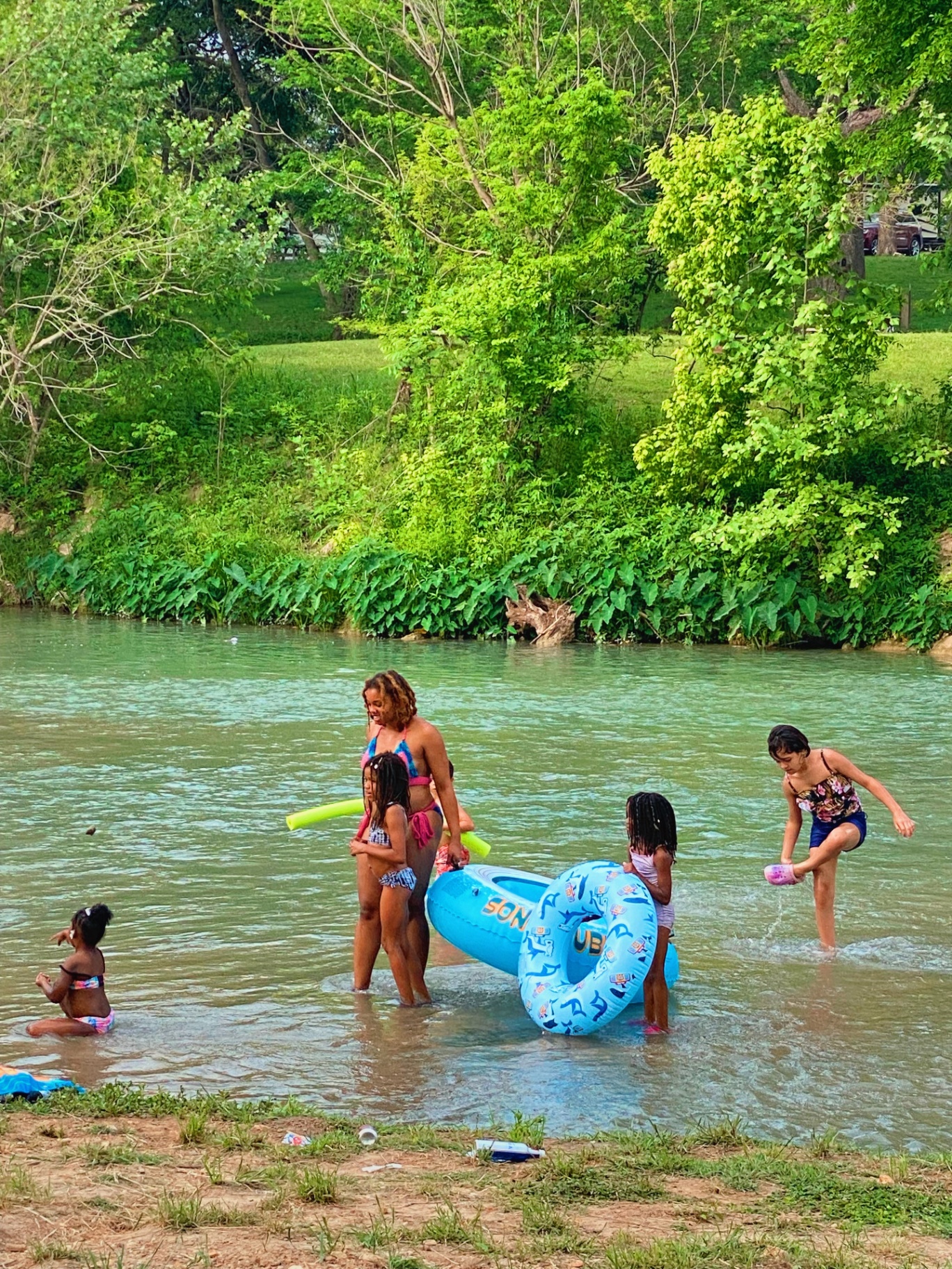 Kids playing in the river