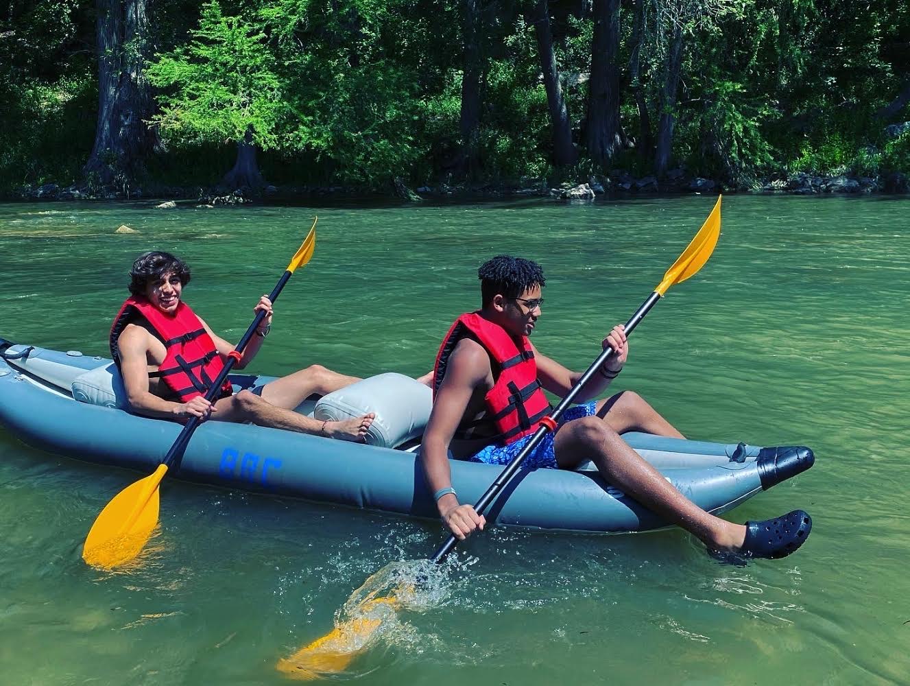 Friends kayaking on the river